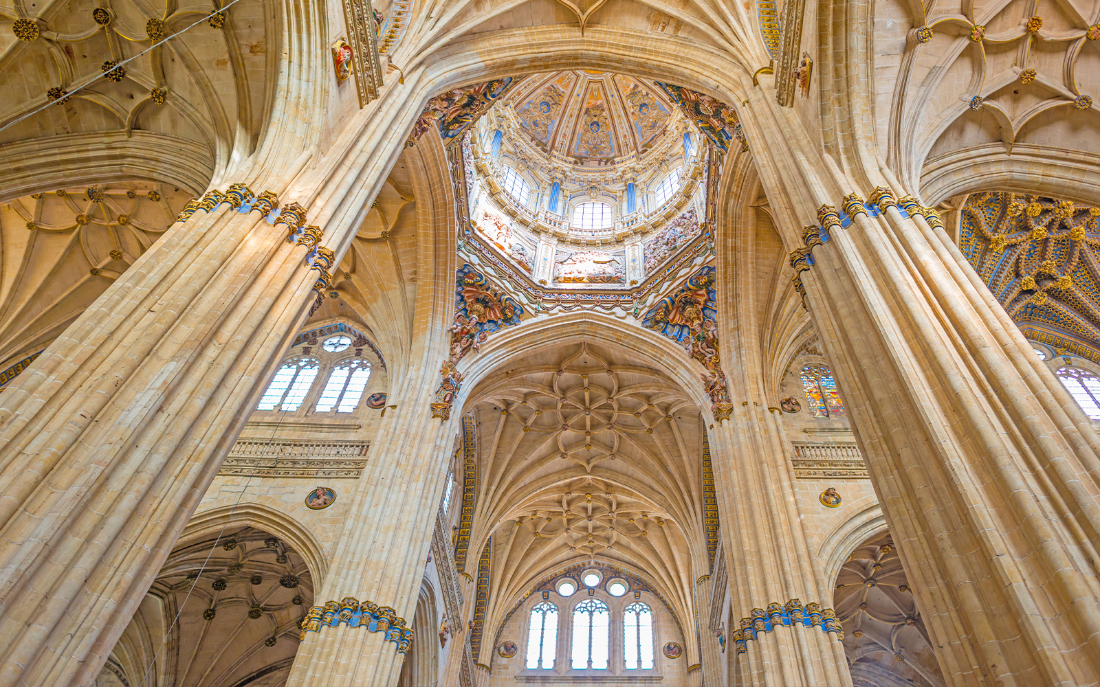 Ceiling of the Cathedral of Salamanca with ornate arches and detailed stonework.