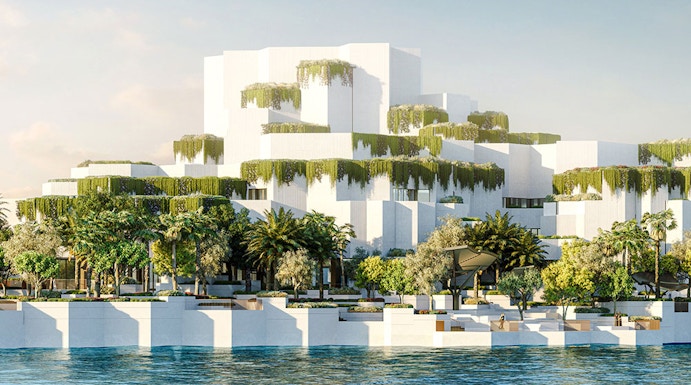 Aerial view of National History Museum Abu Dhabi with tiered white structures and greenery by the water.