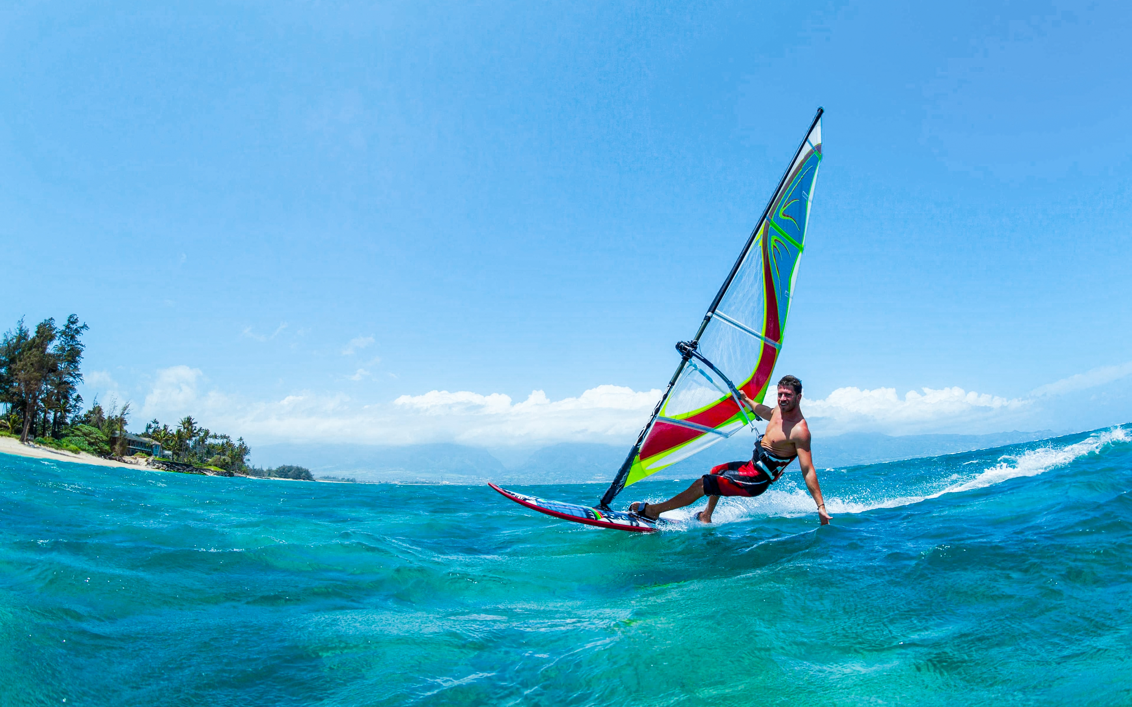 Windsurfing on clear waters in Delta Neretva, Croatia.