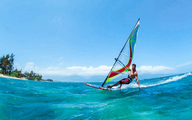 Windsurfing on clear waters in Delta Neretva, Croatia.