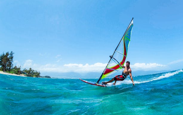 Windsurfing on clear waters in Delta Neretva, Croatia.