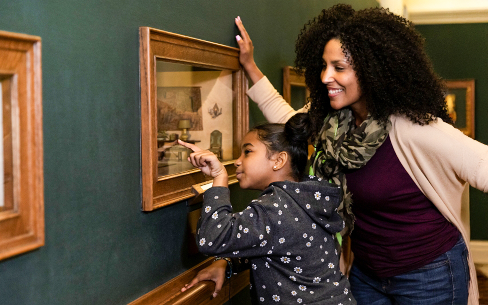 Visitors observing artwork at The Art Institute of Chicago.