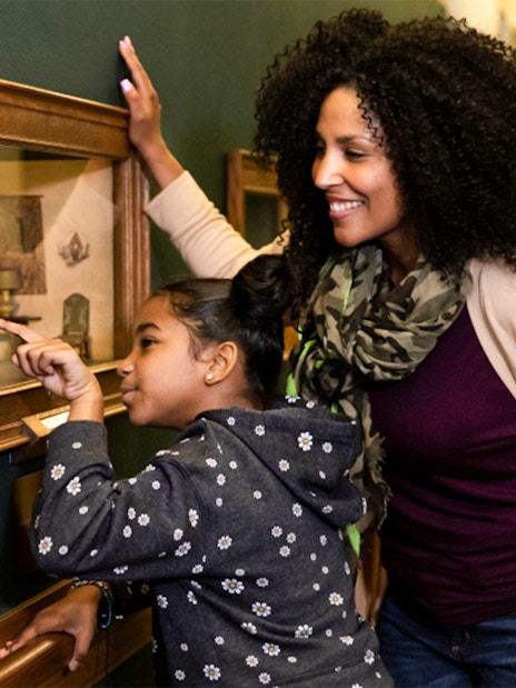 Visitors observing artwork at The Art Institute of Chicago.