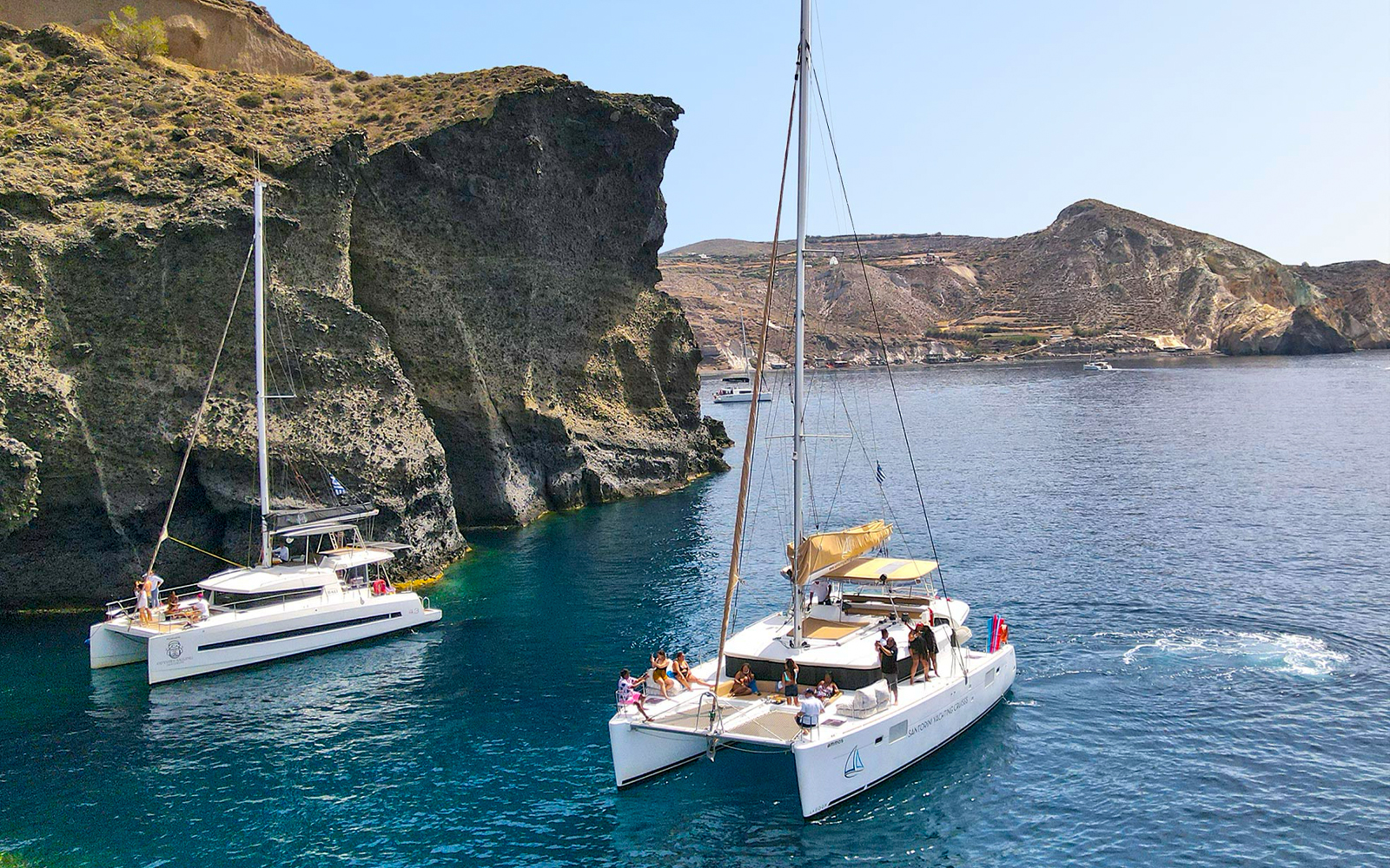 Luxury Daytime or Sunset Santorini Catamaran Cruise with Meal & Open Bar