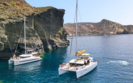Santorini Luxury Catamaran Cruise with Meal, Drinks & Transfers