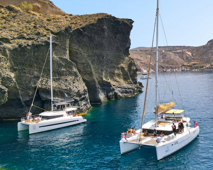 Santorini Luxury Catamaran Cruise with Meal, Drinks & Transfers