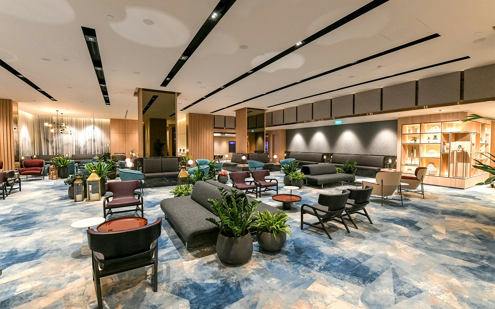 Elegant Changi Lounge in Singapore, with modern seating areas, designer lighting, and an inviting ambiance for travelers to relax