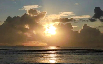Sunset over the ocean in Zanzibar during the Dar es Salaam Masaki Walking Tuk-Tuk Fish Market Tour.