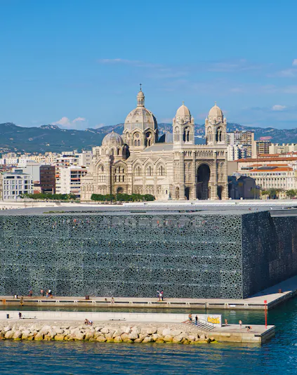 MUCEM in Marseille with cathedral in the background.