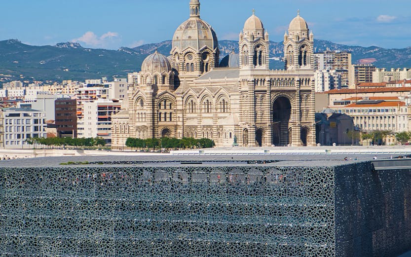 MUCEM in Marseille with cathedral in the background.