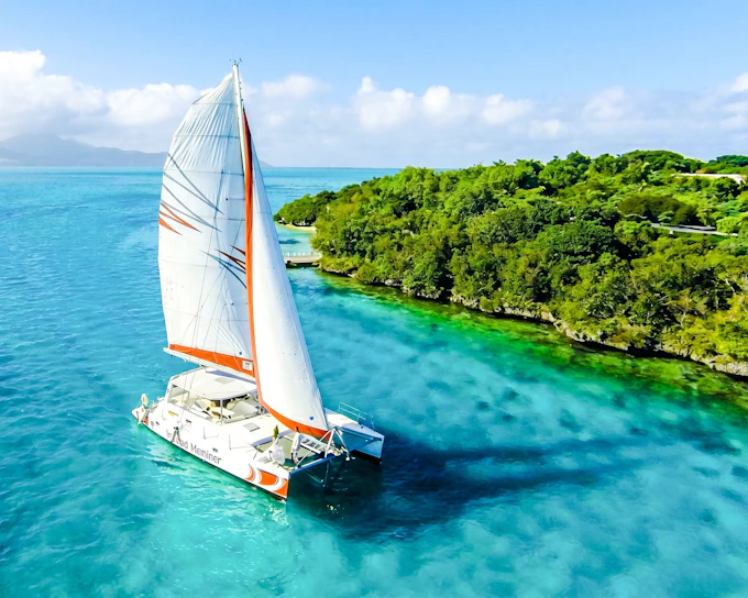 Catamaran Cruise to Ile Aux Cerfs with Parasailing & Lunch