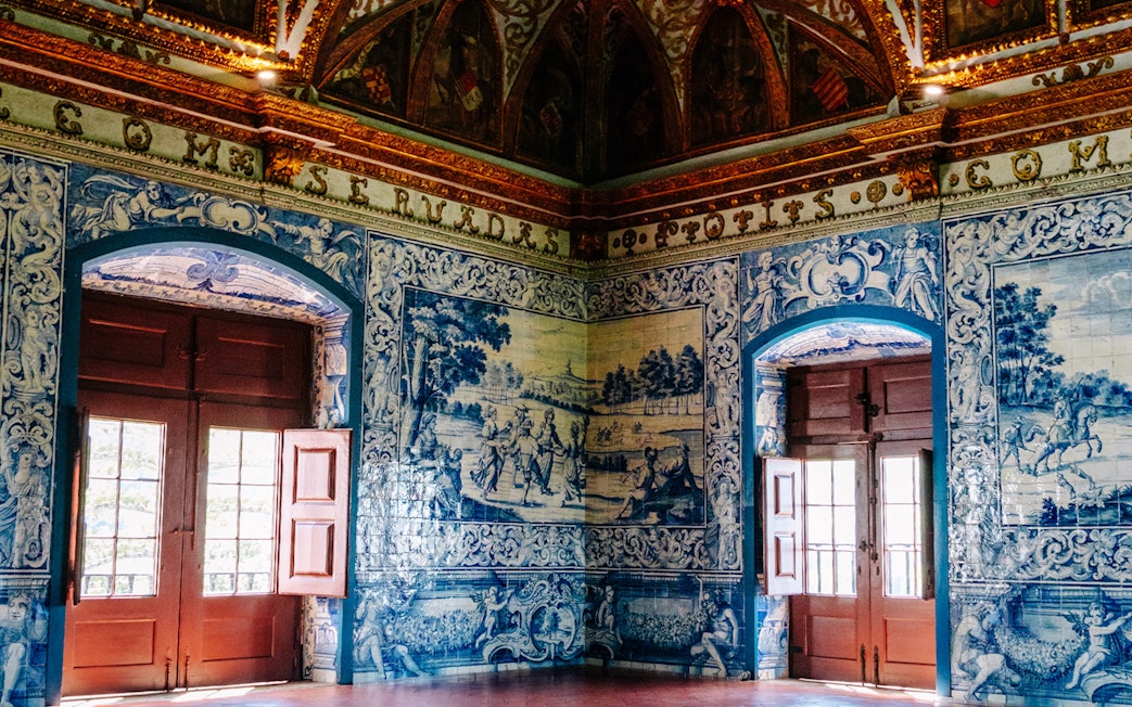 Heraldic Hall's intricate blue tiles in National Palace of Sintra, Portugal.
