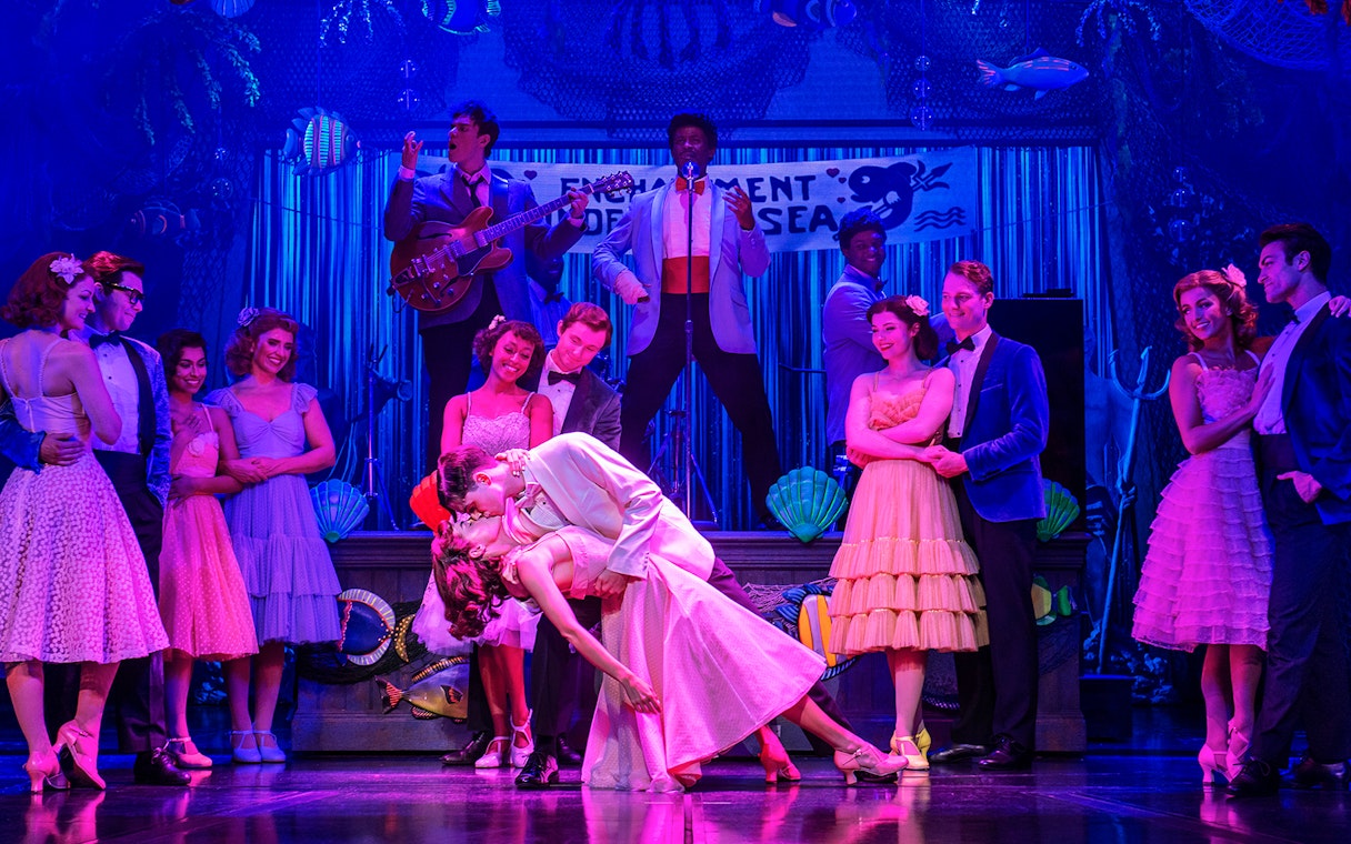 Couple dancing at Enchantment Under the Sea dance, inspired by Back to the Future.
