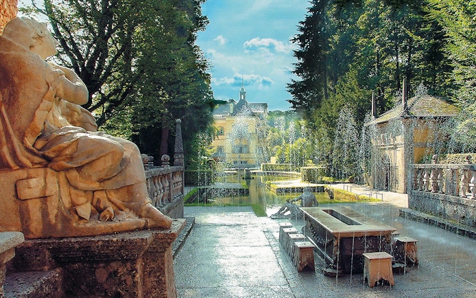 Hellbrunn Palace gardens with fountains in Salzburg, Austria, accessible with Salzburg Card.