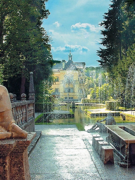 Hellbrunn Palace gardens with fountains in Salzburg, Austria, accessible with Salzburg Card.