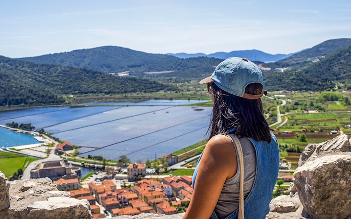 Guest overlooking salt pans and landscape in Ston, Croatia.
