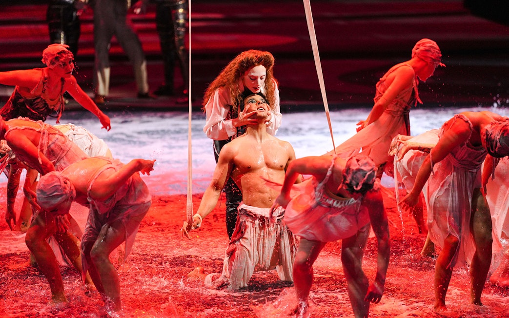 Performers in water during House of Dancing Water show.