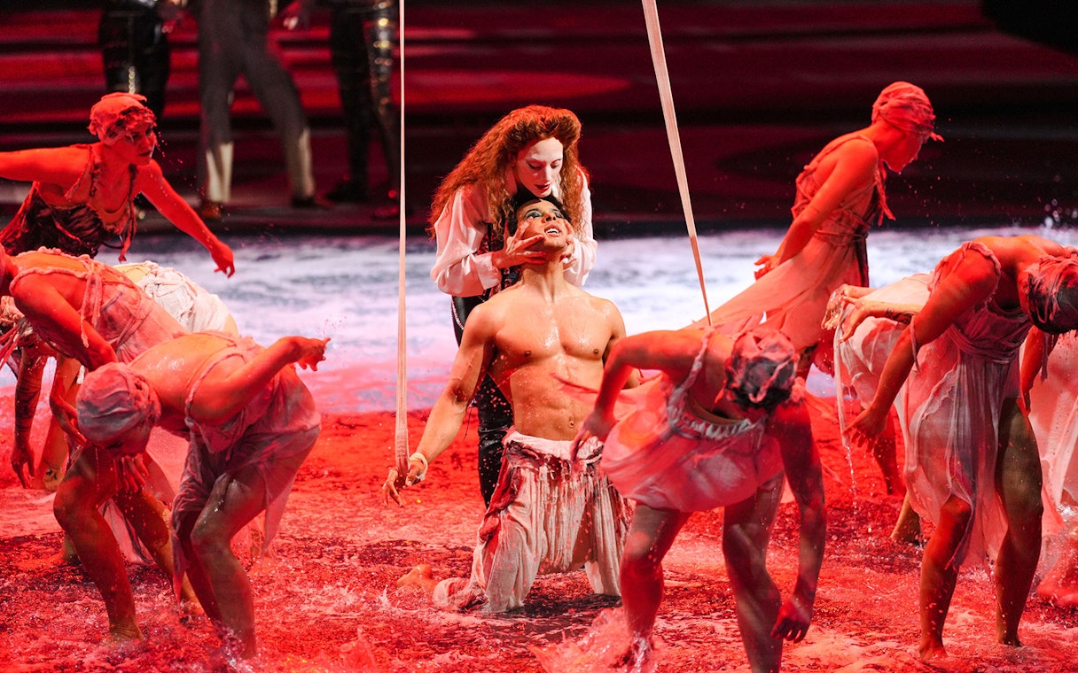 Performers in water during House of Dancing Water show.