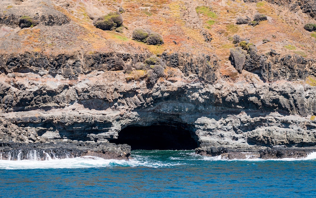 Rocky coastal cave at Phillip Island during seal watching cruise.