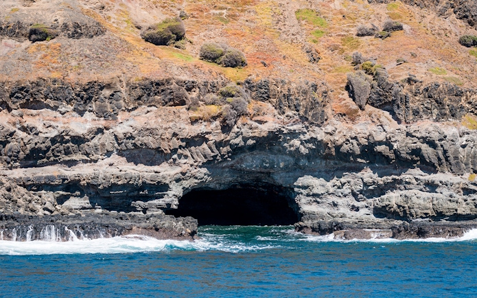 Rocky coastal cave at Phillip Island during seal watching cruise.