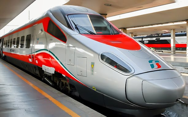 High-speed train at a station for Florence and Tuscany tour from Rome.