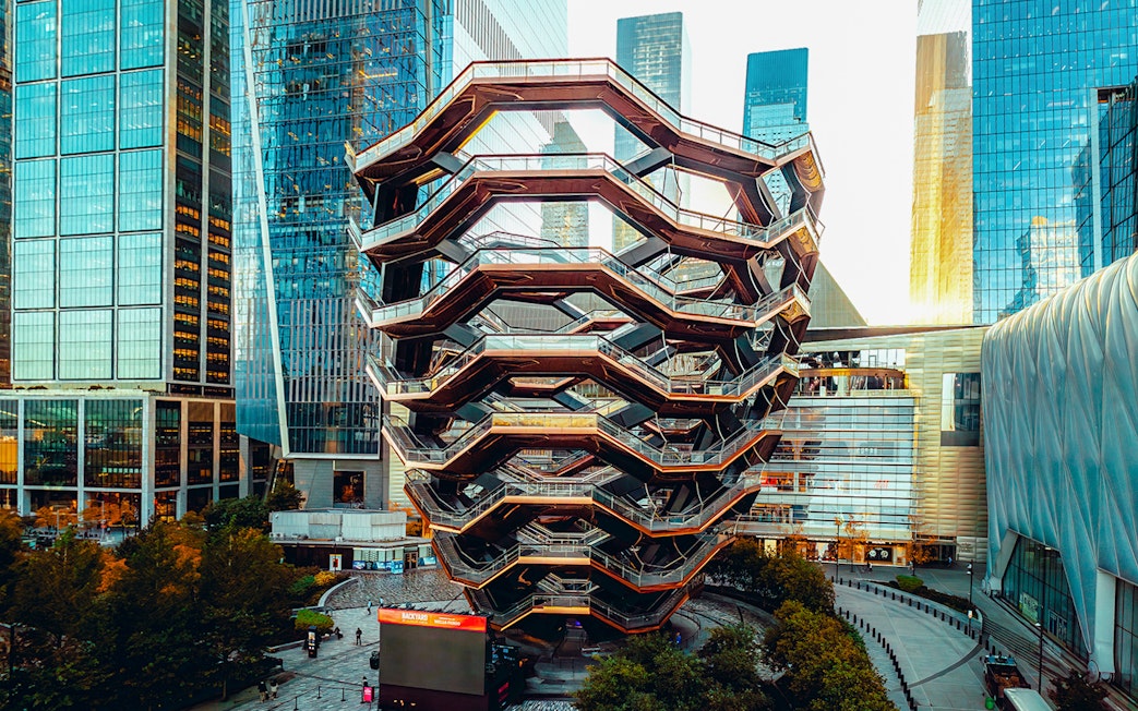 Vessel structure in New York City surrounded by skyscrapers.