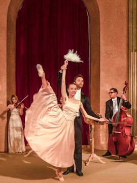 Vienna Residence Orchestra performance with dancers and musicians on stage.