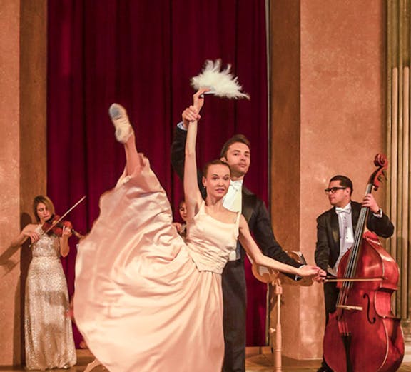 Vienna Residence Orchestra performance with dancers and musicians on stage.