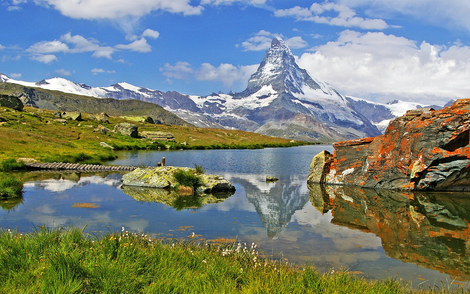 Matterhorn reflected in a serene alpine lake, Zermatt, Switzerland.