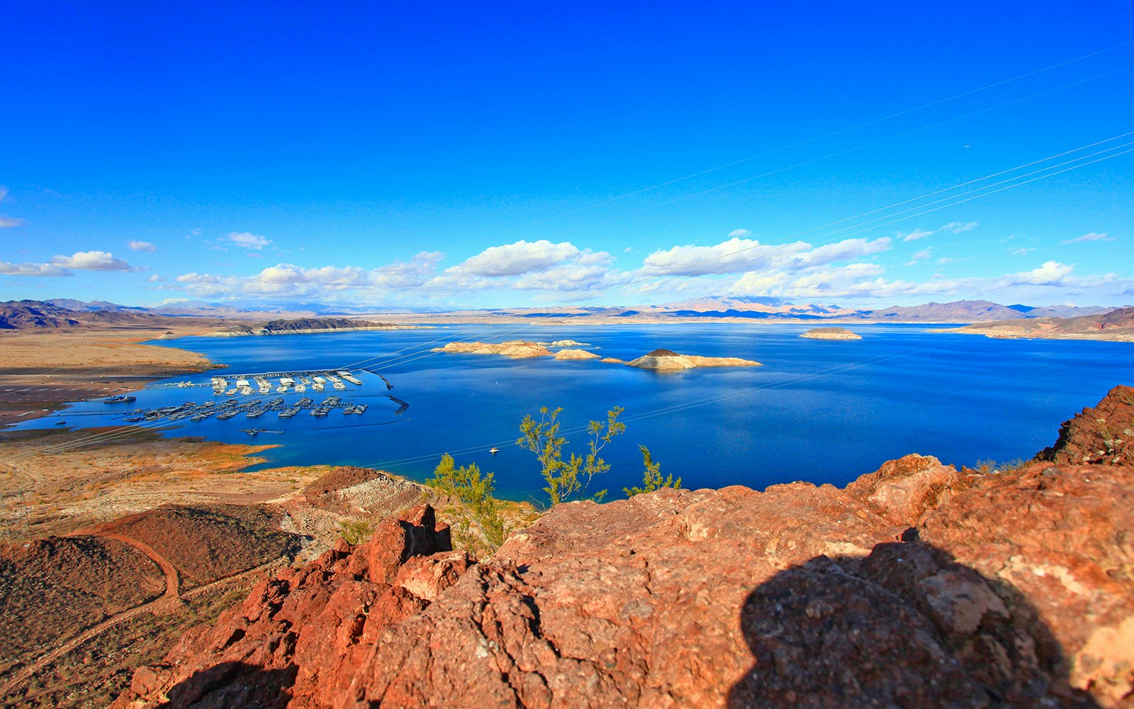 Lake Mead boat tour with scenic views of surrounding desert landscape, Nevada, USA.