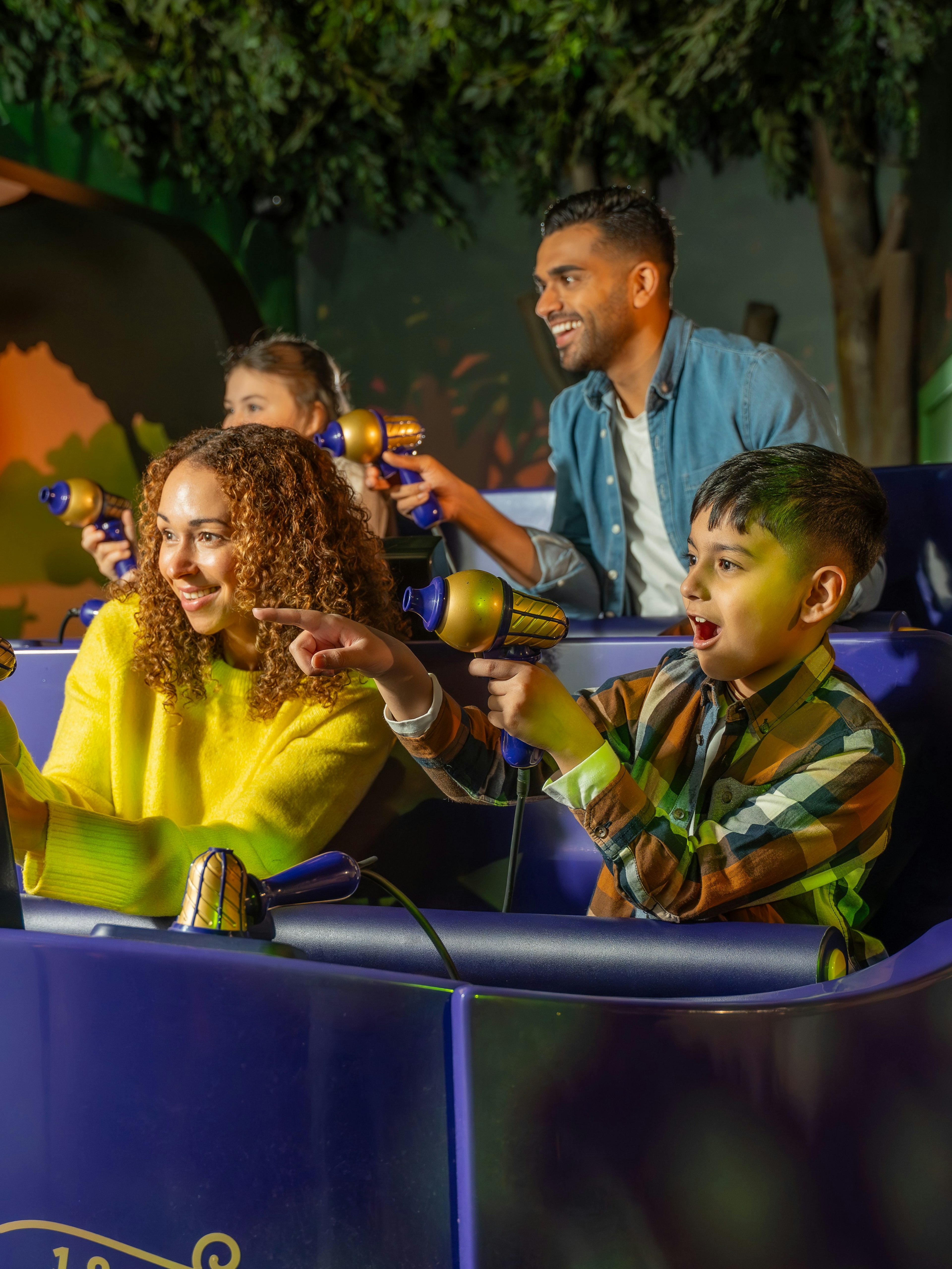 Visitors enjoying interactive ride at Cadbury World, Birmingham.