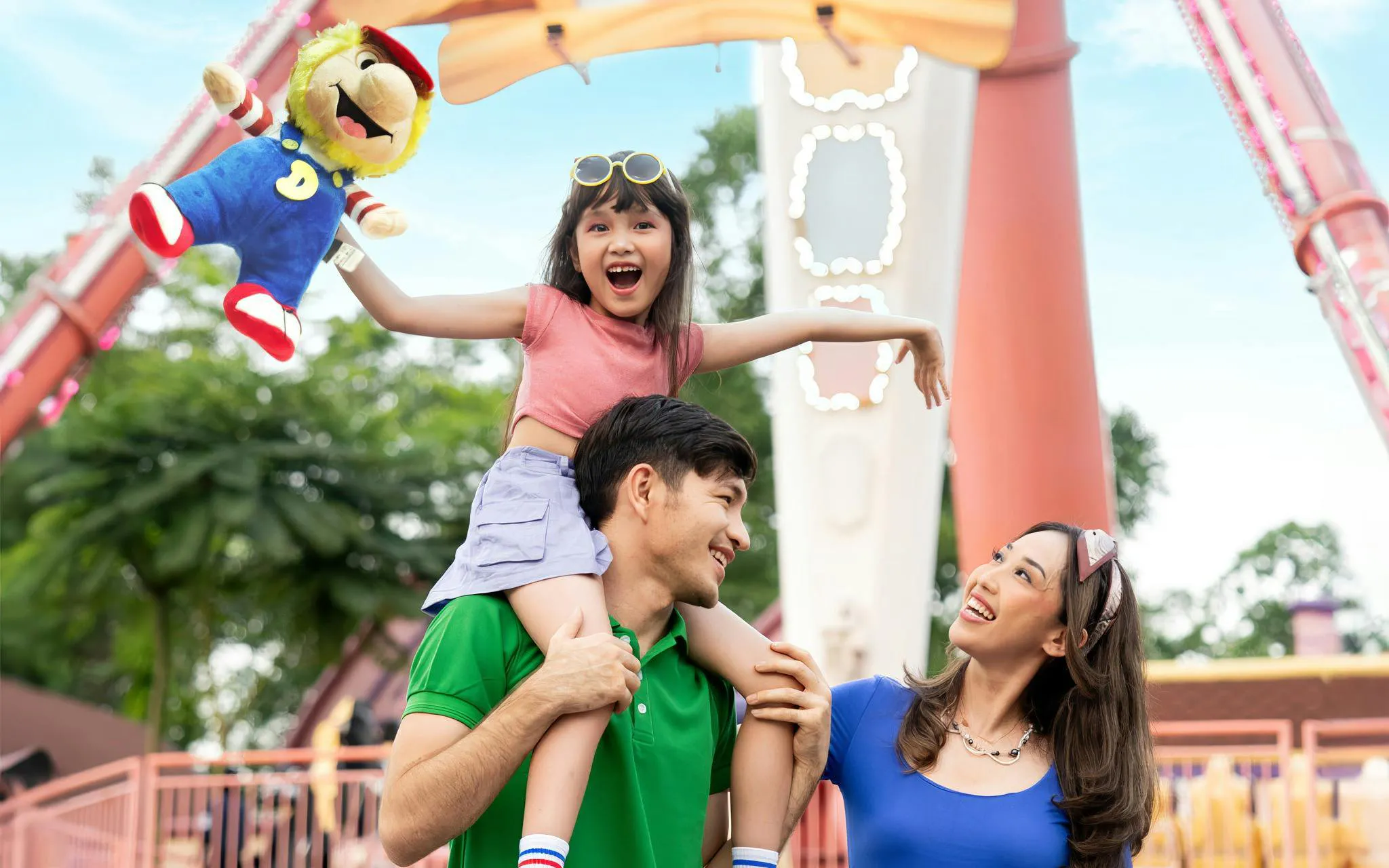 Family enjoying Baling-Baling ride at Dunia Fantasi, Jakarta, Indonesia.