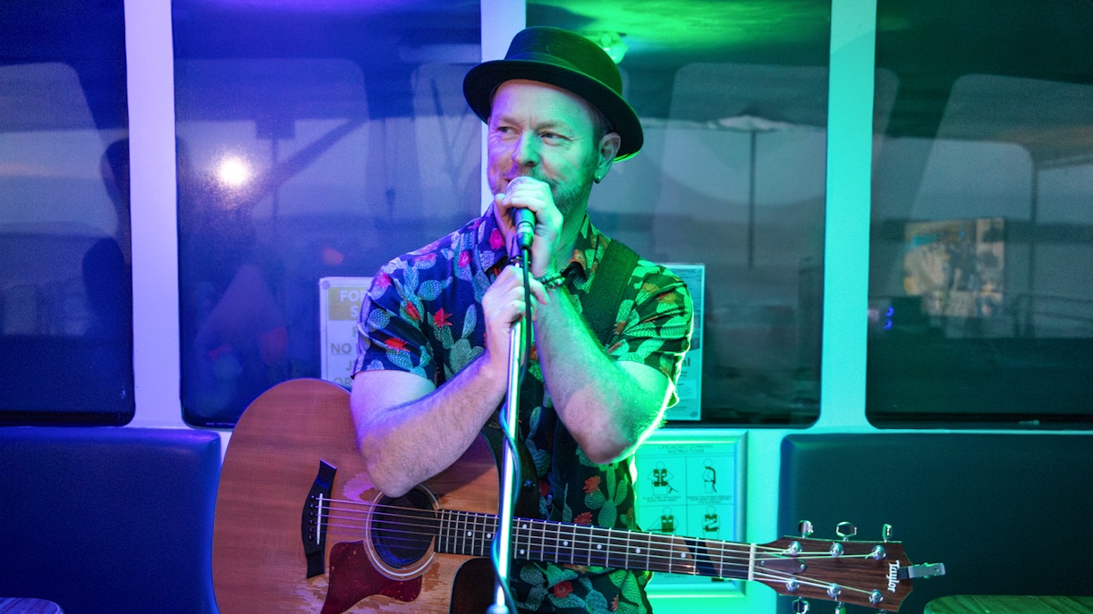 Phillip Island sunset cruise with passengers enjoying views of the coastline and ocean.