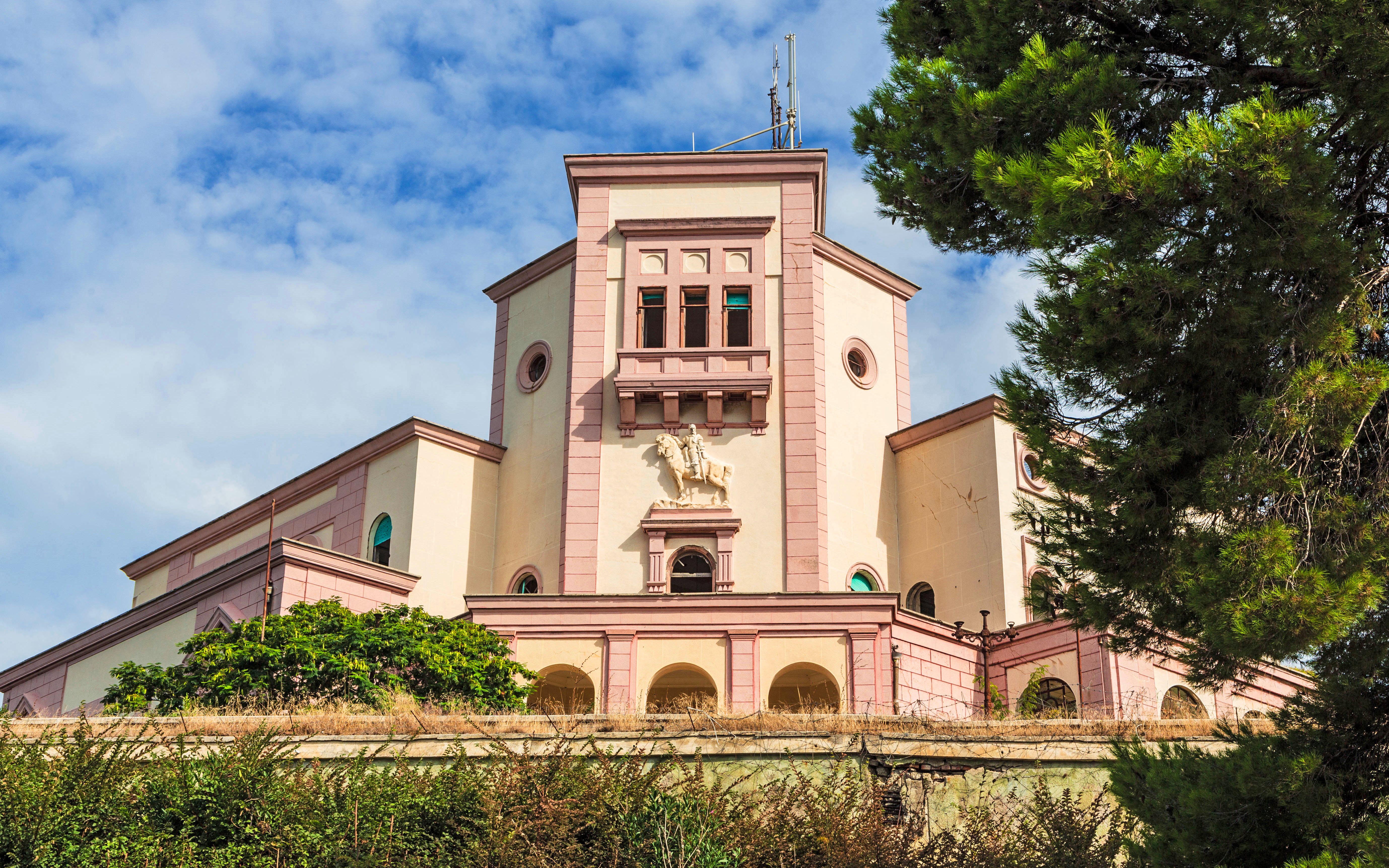 Villa of Zog in Durrës, Albania with detailed facade and surrounding greenery.