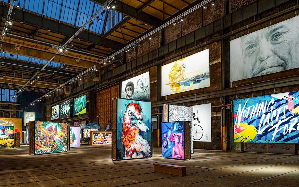 Colorful street art exhibits inside Straat Museum, Amsterdam.