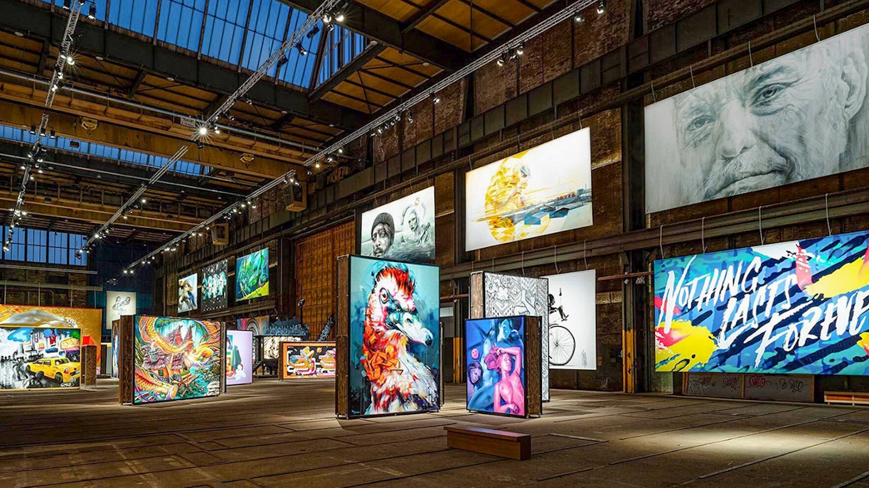 Colorful street art exhibits inside Straat Museum, Amsterdam.