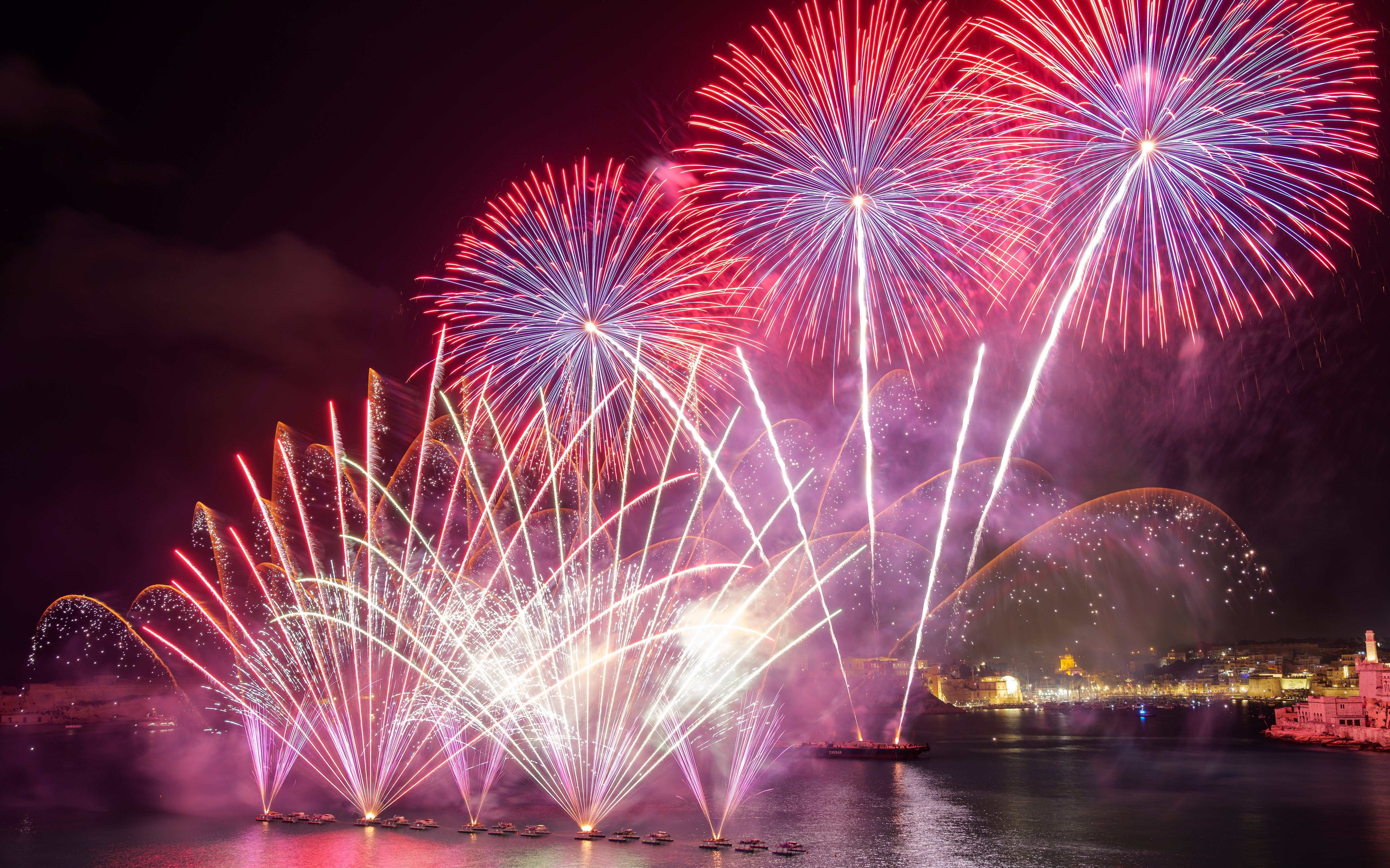 Watch fireworks by the sea