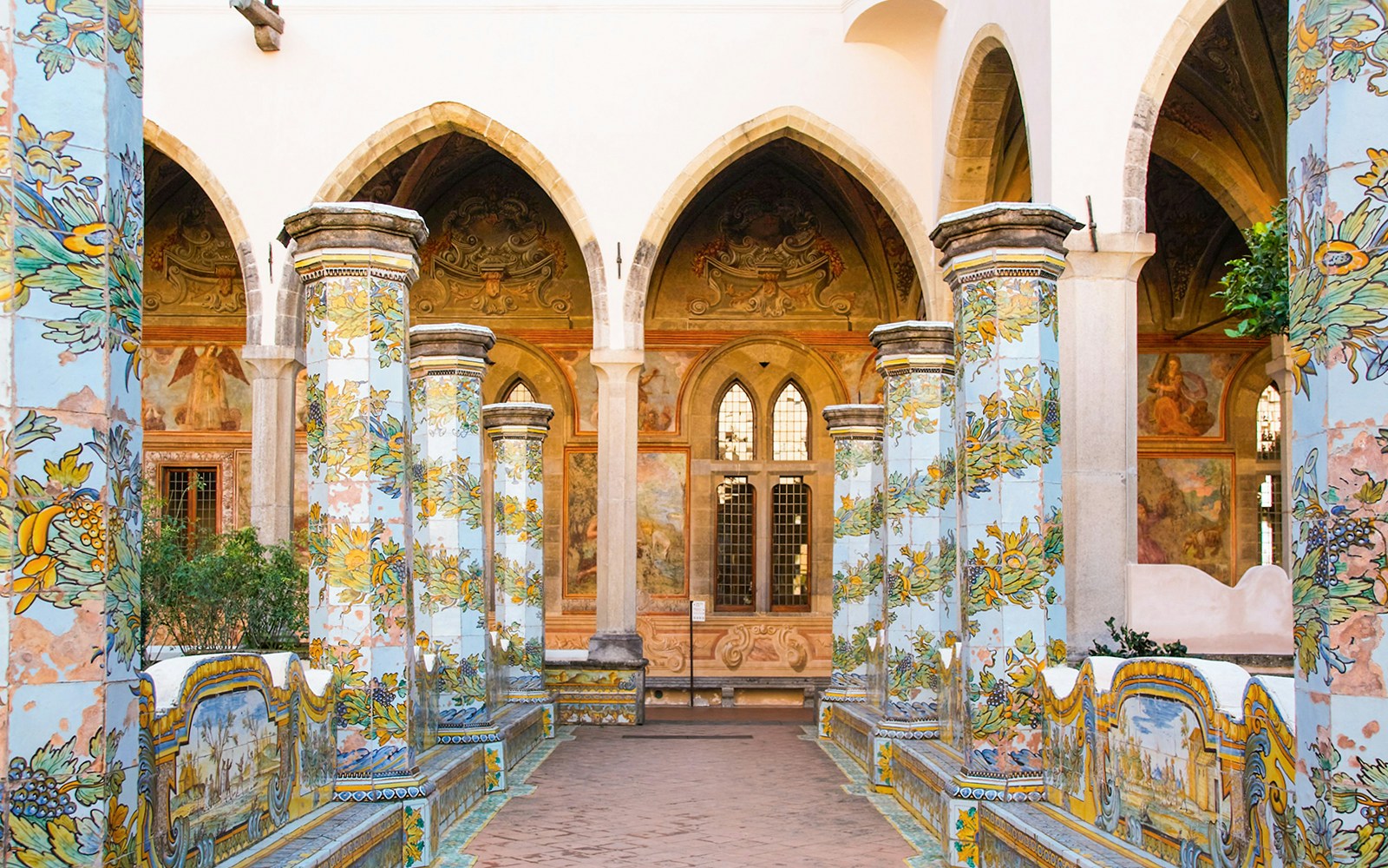 Santa Chiara Monastery mosaic tiles in Naples, Italy, showcasing intricate geometric patterns.