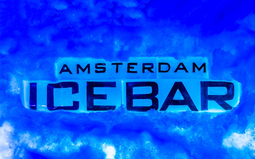 Amsterdam Icebar sign in icy surroundings.