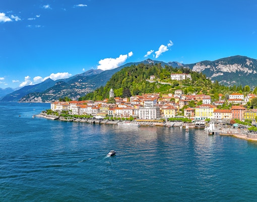 Aerial view of Bellagio village on Lake Como with surrounding mountains and lake.