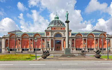 New Carlsberg Glyptotek Museum facade with dome and statues, Copenhagen.