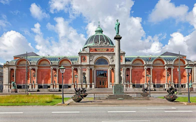 New Carlsberg Glyptotek Museum facade with dome and statues, Copenhagen.