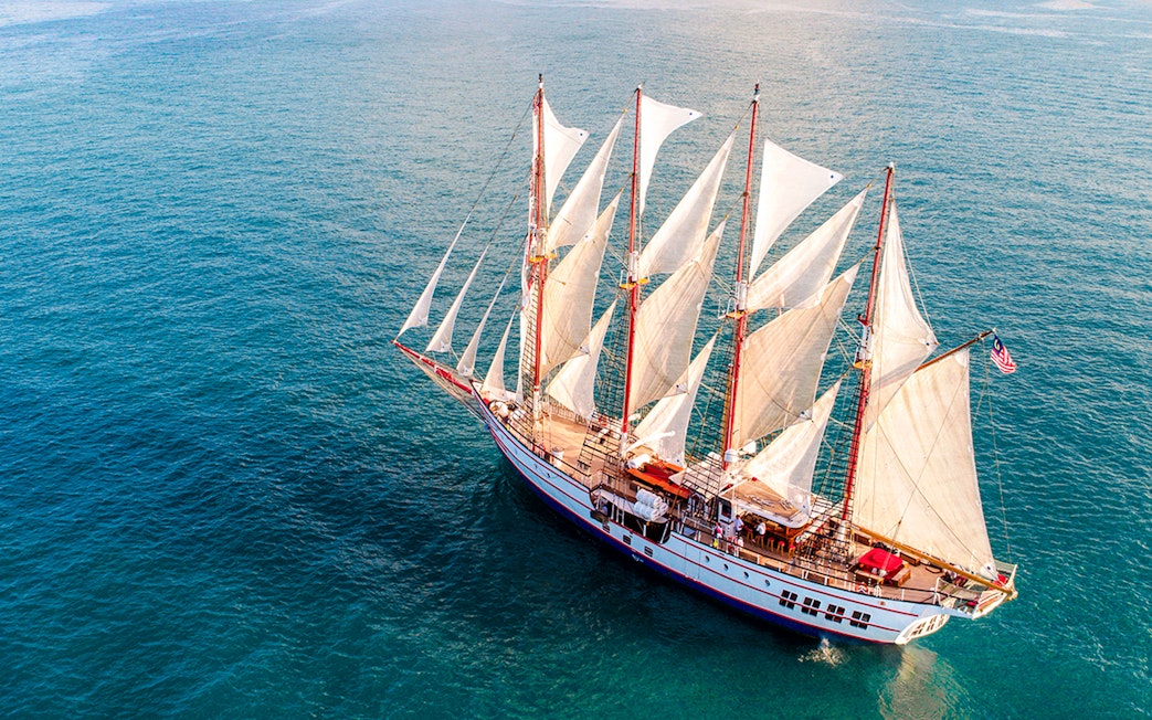 The Royal Albatross sailing on open sea with full sails.