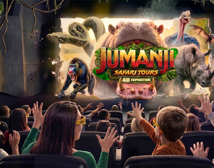 Audience experiencing Jumanji 4D Cinematic at Madame Tussauds New York with immersive effects.