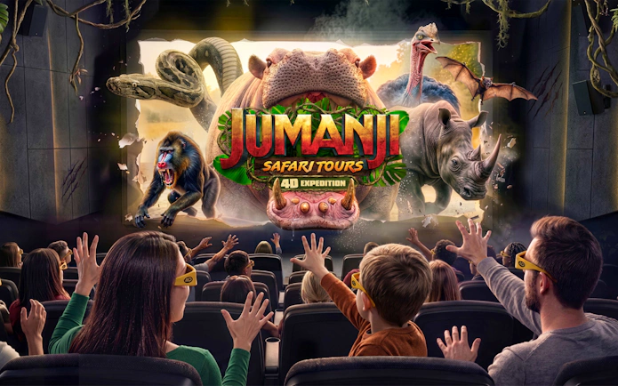Audience experiencing Jumanji 4D Cinematic at Madame Tussauds New York with immersive effects.