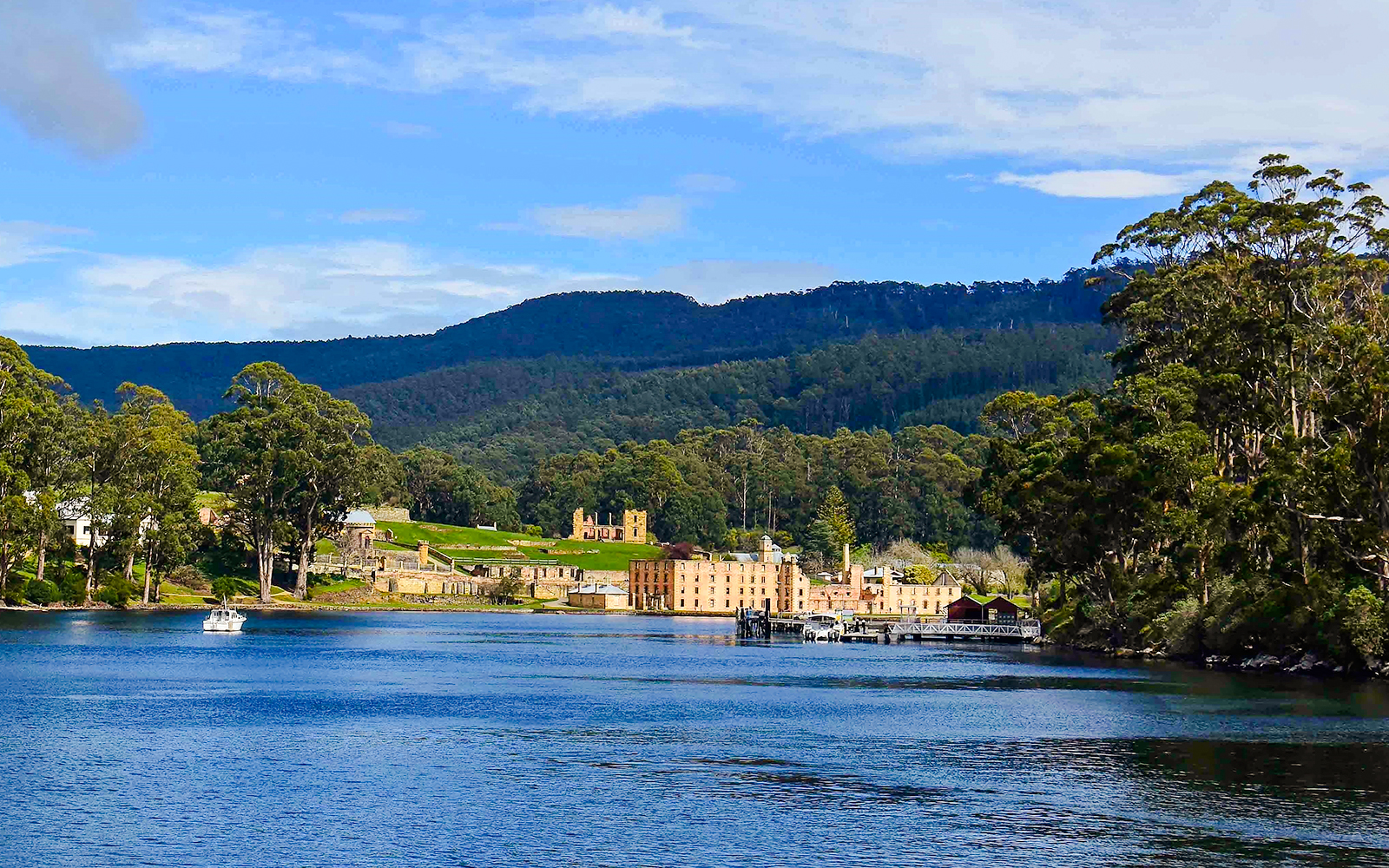 Point Puer at Port Arthur Historic Site with buildings and forested hills, Tasmania.