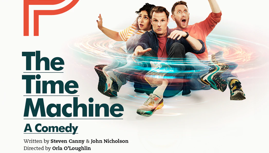 Three people sitting on a swirling time machine, promoting "The Time Machine - A Comedy.