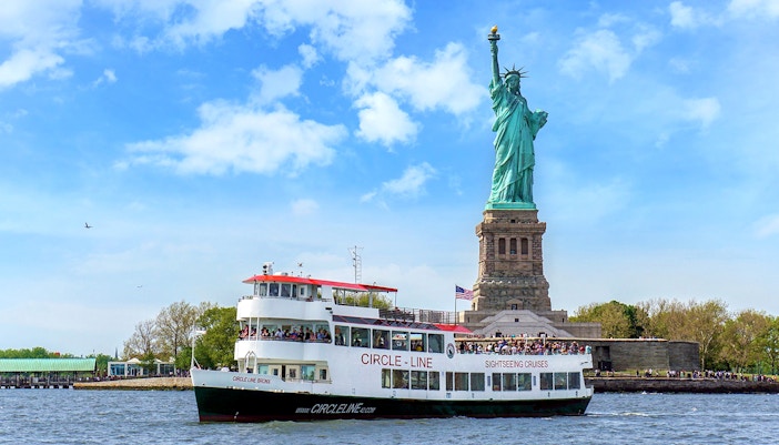 View of New York City skyline at night from the Circle Line: 2hr NYC Harbor Lights Cruise