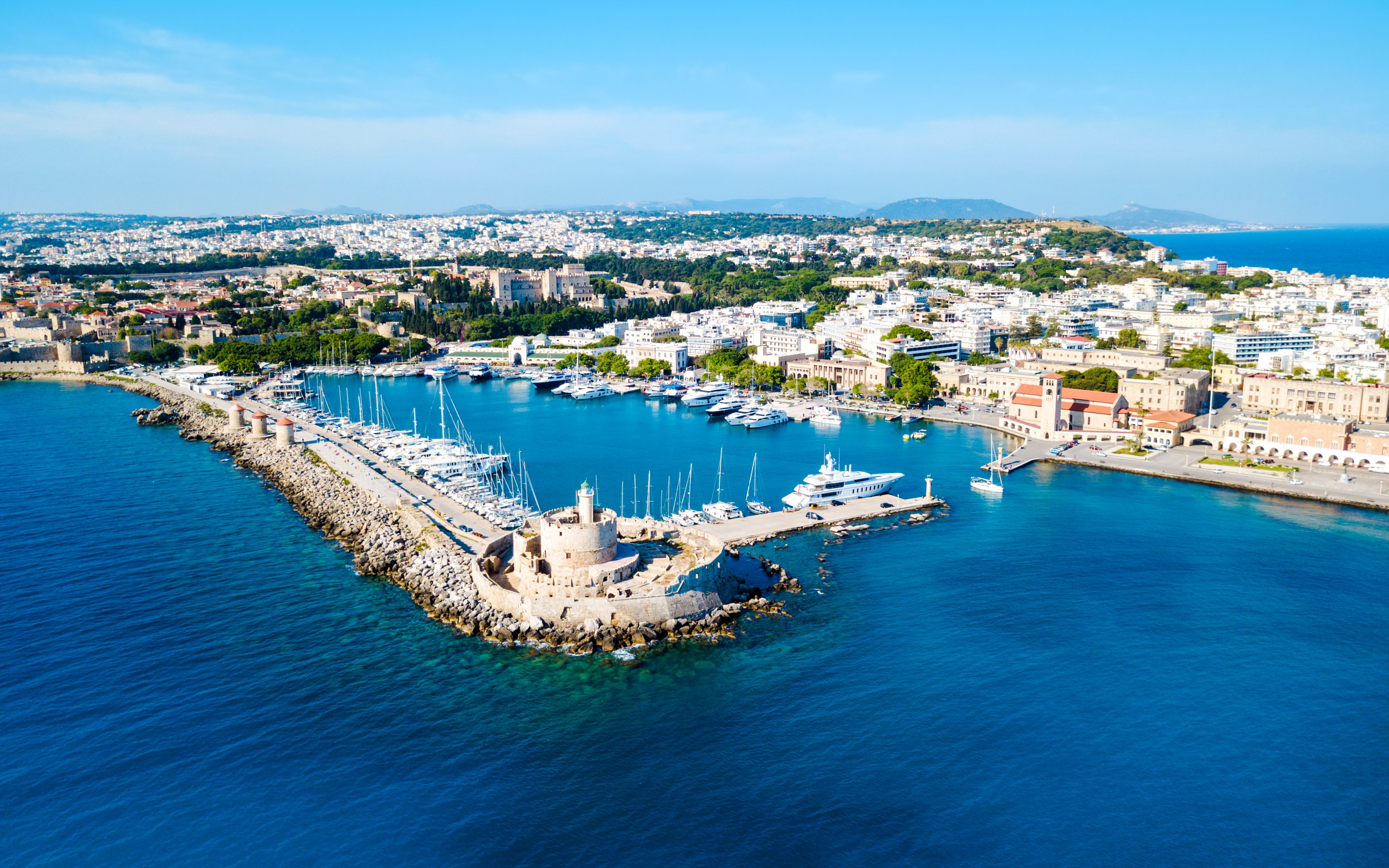 Mandraki Port harbor view with yachts during a Rhodes cruise, Greece.