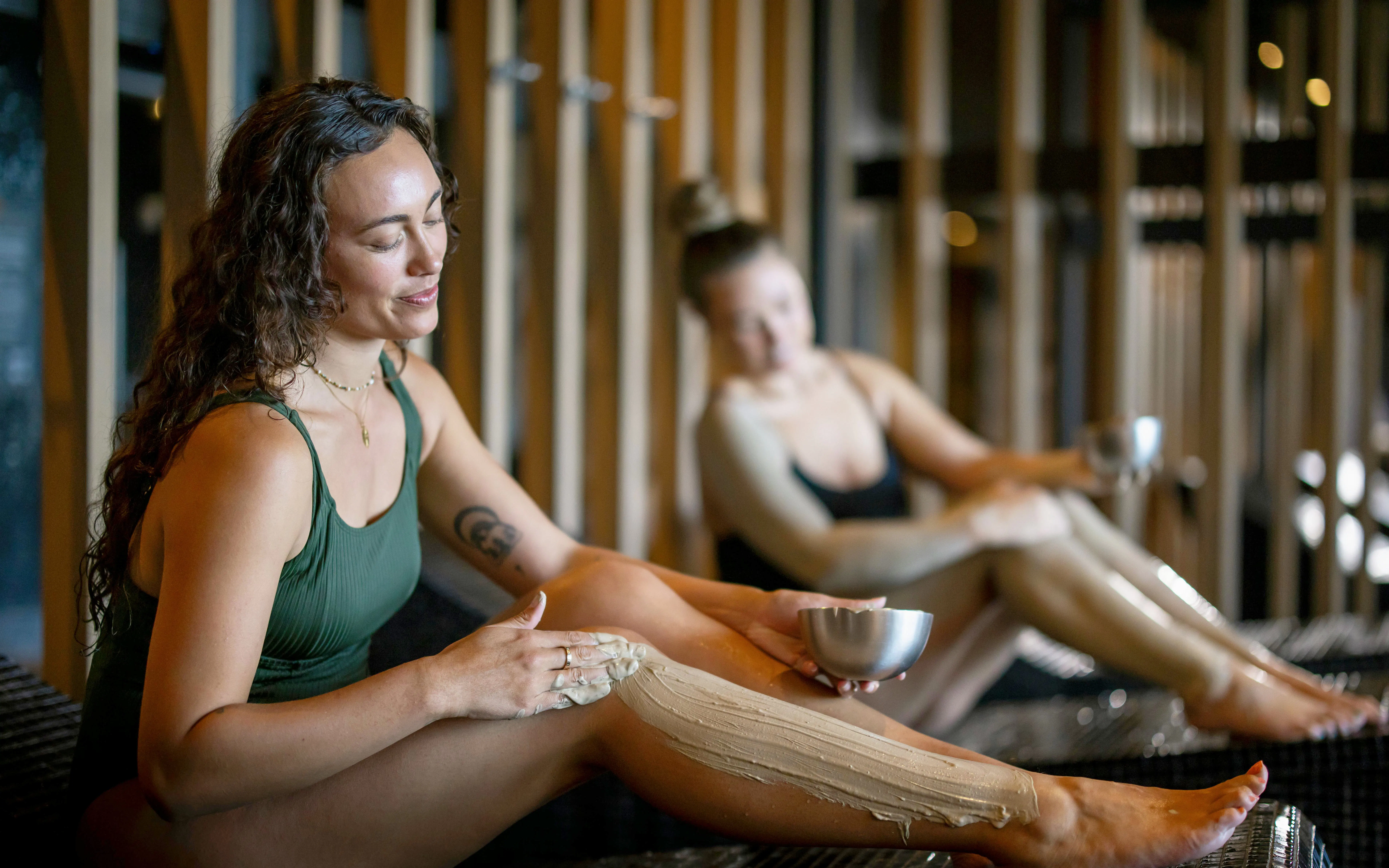 Guests applying geothermal mud at Wai Ariki Hot Springs & Spa, Rotorua.